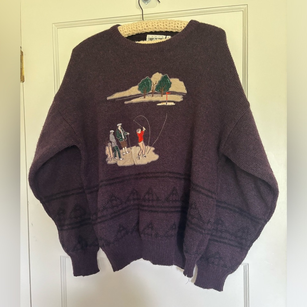 Vintage Wings golf sweater, seam parting at cuffs.